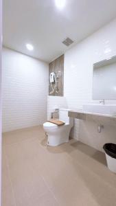 Koupelna v ubytování Srinuan Living Hotel