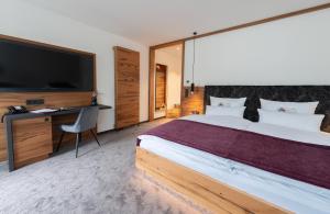 Postel nebo postele na pokoji v ubytování Kur- und Wellnesshotel Förch