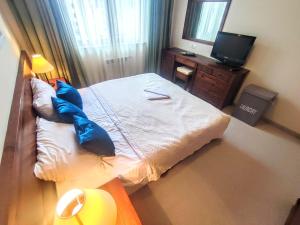 Postel nebo postele na pokoji v ubytování Private 1bedroom apt in SPA Resort - SPA included + 23 fotografií