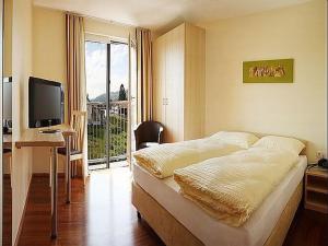 Postel nebo postele na pokoji v ubytování Das smarte Hotel garni