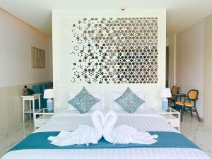 Sand Dance Hotel客房内的一张或多张床位