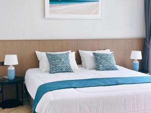Sand Dance Hotel客房内的一张或多张床位