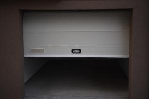 ajar view of a bed in a room at SM apartman in Bijeljina +41 photos