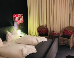 Postel nebo postele na pokoji v ubytování beans parc hotel jade