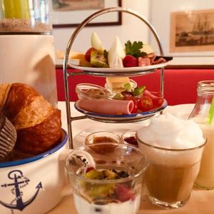 a tray of food on a table with a plate of food at beans parc hotel jade in Wilhelmshaven