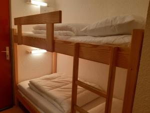 Tempat tidur susun dalam kamar di Studio Gavarnie