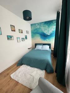 Posteľ alebo postele v izbe v ubytovaní Suite Cosy Californienne en Hyper Centre