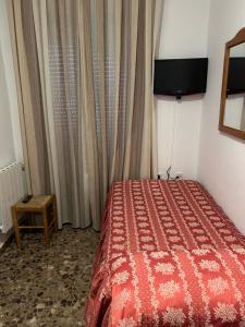 Postel nebo postele na pokoji v ubytování LABELLA - Hostal Rural Restaurante
