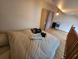 Giường trong phòng chung tại La petite maison