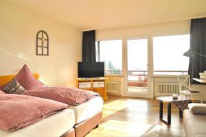 TV a/nebo společenská místnost v ubytování Landpension Pferdekoppel - B&B - Self Checkin