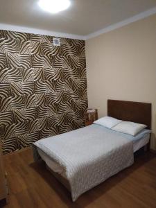Ένα ή περισσότερα κρεβάτια σε δωμάτιο στο FEIDUM quarters flat