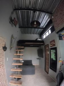 a room with a staircase in a house at Casa Figueroa in Puerto Colombia