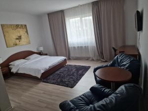 Postel nebo postele na pokoji v ubytování Eden
