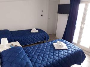 Posteľ alebo postele v izbe v ubytovaní Casa Principe Umberto