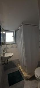 A bathroom at Patra Studio B4 Még 18 kép