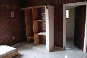 Ein Bett oder Betten in einem Zimmer der Unterkunft KABA Local Rwandan Guesthouse Entire Property for you with Tour services in and out the city such as Safari's