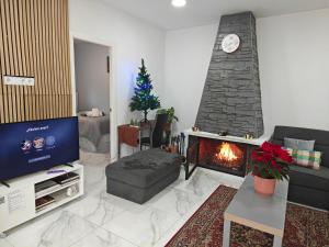 TV a/nebo společenská místnost v ubytování Relax House Barcelone