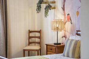 Ένα ή περισσότερα κρεβάτια σε δωμάτιο στο Sunny House by Homie +32 φωτογραφίες