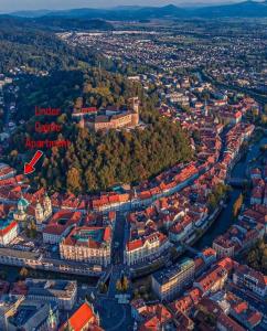 an aerial view of the city of brasov at Under Castle Apartment in Ljubljana