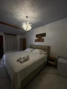 Cama o camas de una habitación en Pousada Vila Velha