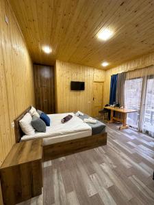 Postel nebo postele na pokoji v ubytování Haleb Hotel Complex