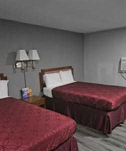 Krevet ili kreveti u jedinici u objektu Royal Inn Motel