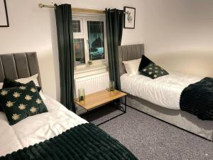Postel nebo postele na pokoji v ubytování Brook Meadow Entire Home Stay
