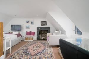 Llit o llits en una habitació de Pass the Keys Cosy Studio Apartment