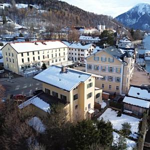 an aerial view of a town with snow covered buildings at Ferienhaus Steinbacher direkt am Tegernsee in Tegernsee