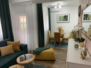 A seating area at VESTA Apartman
