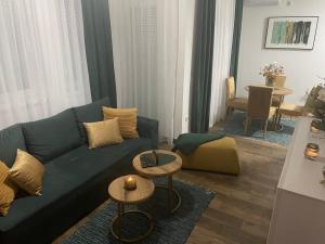A seating area at VESTA Apartman
