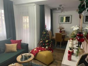 A seating area at VESTA Apartman