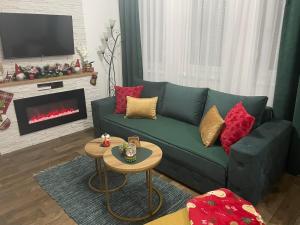 A seating area at VESTA Apartman