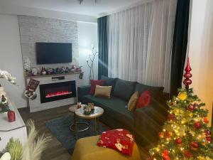 A seating area at VESTA Apartman