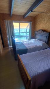 Katil atau katil-katil dalam bilik di Casa Hebe