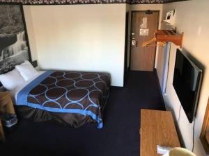 מיטה או מיטות בחדר ב-Best Inn