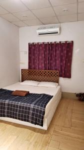 Postel nebo postele na pokoji v ubytování Mulberry resort