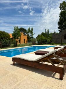 Kolam renang di atau dekat dengan Aroma de campo