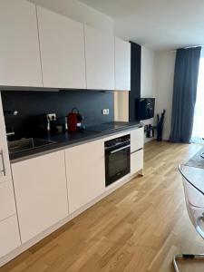 A kitchen or kitchenette at The View 1