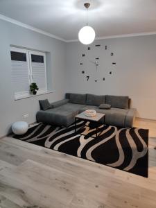 Posezení v ubytování Ferienhaus Devilina mit Sauna am Harkebrügger See