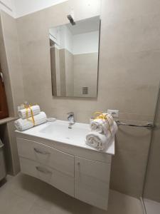 Ένα μπάνιο στο Rooms&Suite