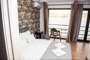 Letto o letti in una camera di Boatel Copacabana