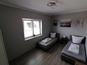 Posezení v ubytování Ferienhaus Devilina mit Sauna am Harkebrügger See