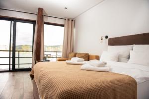 Letto o letti in una camera di Boatel Copacabana