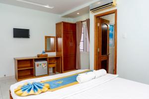 TV a/nebo společenská místnost v ubytování TNH Hotel Vung Tau