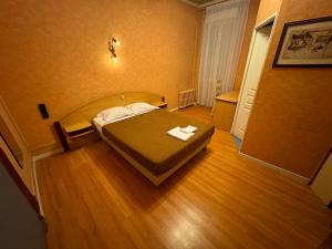 Letto o letti in una camera di Le Terminus d'Albi