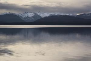 a view of a lake with mountains in the background at Hostería Sur in San Carlos de Bariloche