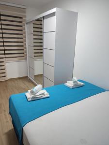 En eller flere senger på et rom på Apartman Silvija Divčibare
