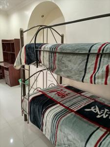Voodi või voodid majutusasutuse Hostal Atlantis toas