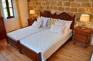 Voodi või voodid majutusasutuse Hotel Ellique toas